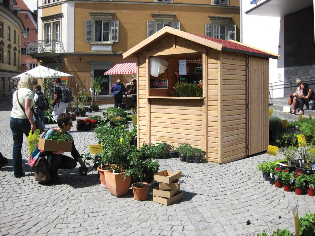 Karibu Sales House 1. Nyeregtetős árusító faház/vásári pavilon, natúr fából 265 cm x 182 cm (RP)